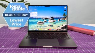 MacBook Pro M5 with Black Friday deal tag superimposed