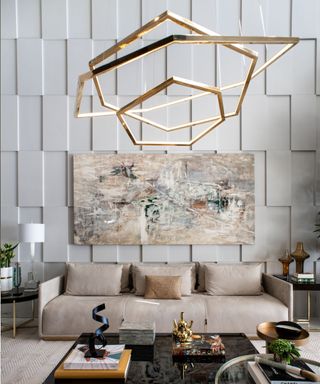 Neutral living room with a maximalist feel by Erik Munro Interiors featuring the Vesanto light from Cameron Design House