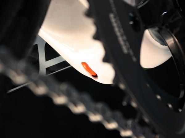 A new access port on the 2011 Izalco Team frame eases front derailleur cable routing for mechanics.