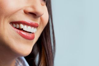 Stock photo of a woman's mouth.