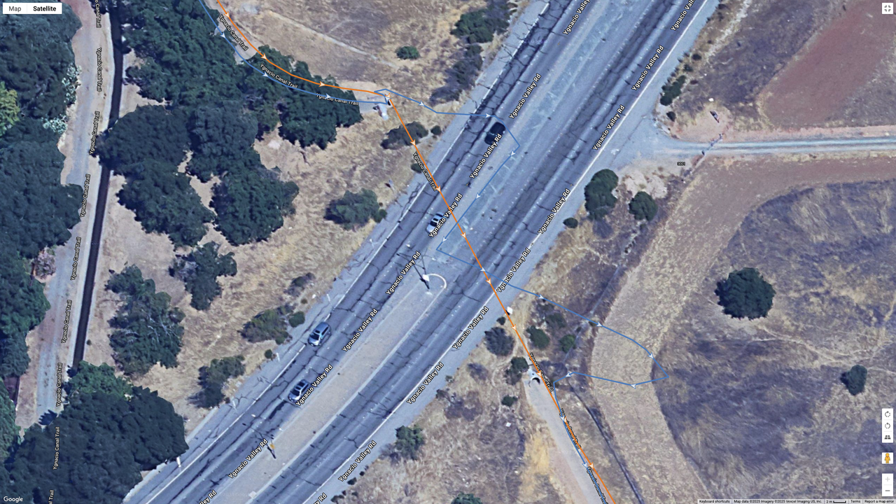 A Google Maps satellite image showing how the COROS PACE 4 (orange line) compares to the Garmin Forerunner 970 (blue line) for dual-frequency GPS accuracy for a suburban route.