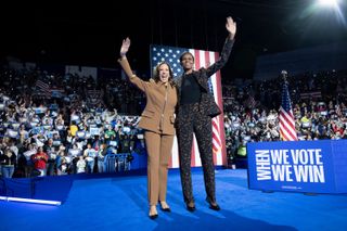 Kamala Harris and Michele Obama onstage at a Michigan rally