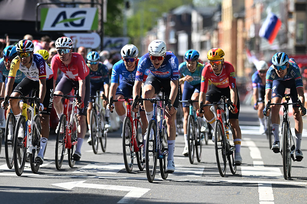 Egan Bernal and Emiel Verstrynge cross the finish line during the 112th Liege - Bastogne - Liege 2026