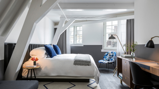 A luxury bedroom at the Kimpton De Witt hotel, Amsterdam