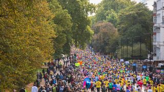 Participants in the Royal Parks Half Marathon run down South Carriage Drive