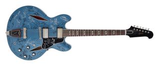 A Gibson Trini Lopez signature model, signed by Dave Grohl, Krist Novoselic and more