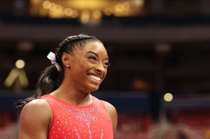 imone Biles reacts during warm ups prior to the Women's competition of the 2021 U.S. Gymnastics Olympic Trials at America’s Center, Simone Biles boyfriend height