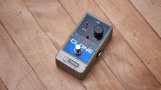 Electro-Harmonix Neo Clone pedal on a wooden floor