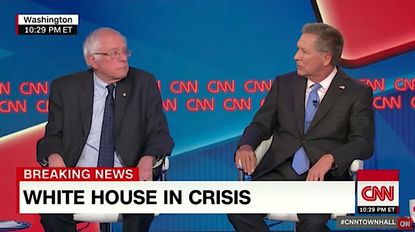 Bernie Sanders and John Kasich argue over Donald Trump