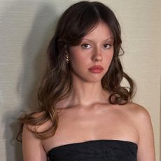 mia goth with curtain fringe hairstyle 