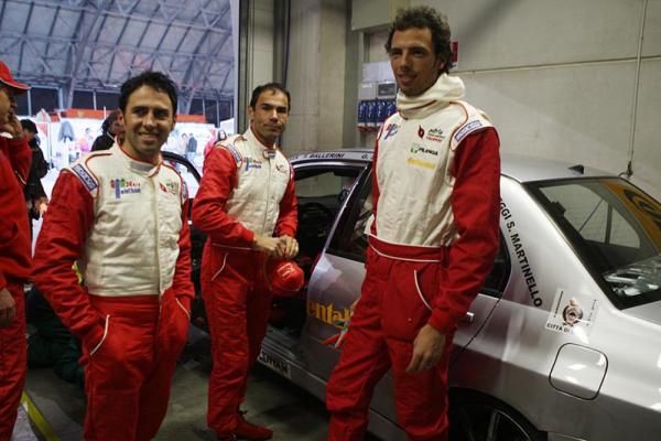 Simoni, Davide Cassani (c) and Alessandro Ballan (r) uip the ante with some extra speed.