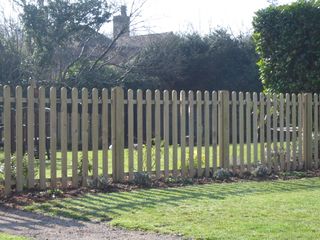 low wooden post and rail fence