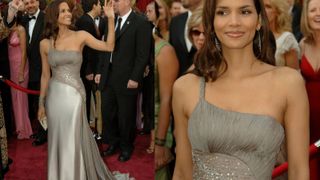 Halle Berry on the red carpet at the oscars wearing silver grey versace