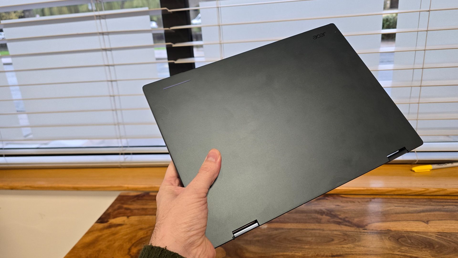 Acer Googlebook 14 on a wooden desk in an office