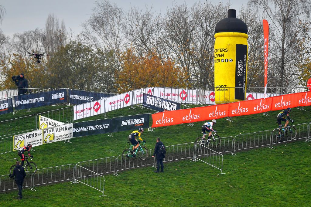 BOOM BELGIUM DECEMBER 06 Michael Vanthourenhout of Belgium and Team Pauwels Sauzen Bingoal Wout Van Aert of Belgium and Team JumboVisma Eli Iserbyt of Belgium and Team Pauwels Sauzen Bingoal Toon Aerts of Belgium and Team Telenet Baloise Lions Peloton Fans Public during the 6th Superprestige Cyclocross Boom 2020 Men Elite De Schorre Boom Superprestige2021 SPBoom SuperprestigeCX on December 06 2020 in Boom Belgium Photo by Luc ClaessenGetty Images
