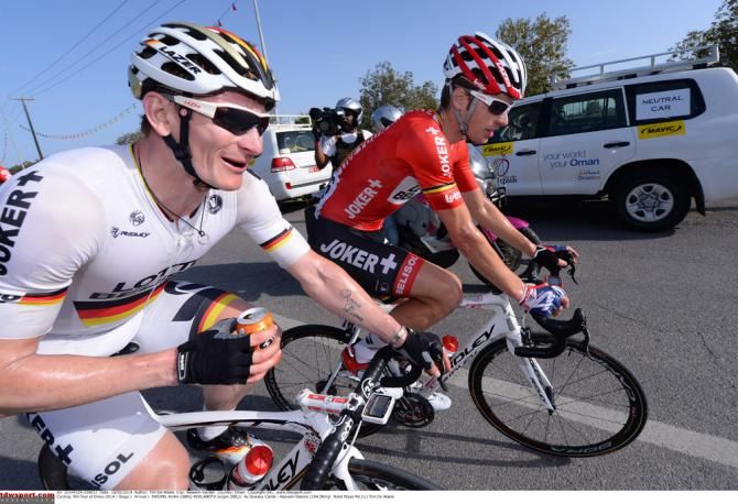 All smiles for stage 1 winner Andrei Greipel (Lotto Belisol) as the German champion heads to the podium