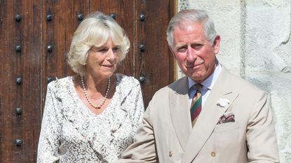Prince Charles, Prince of Wales and Camilla, Duchess of Cornwall, unveil a plaque to mark the restoration of The Duchy Palace