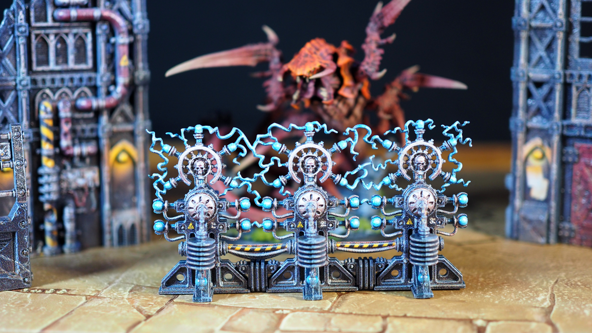 Warhammer 40K pre-painted Armageddon terrain, with a Red Terror visible in the background