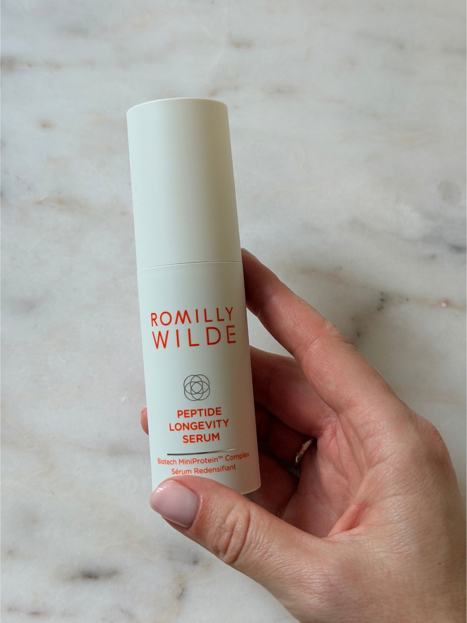Freelance beauty editor Grace Day holding the Romilly Wilde serum