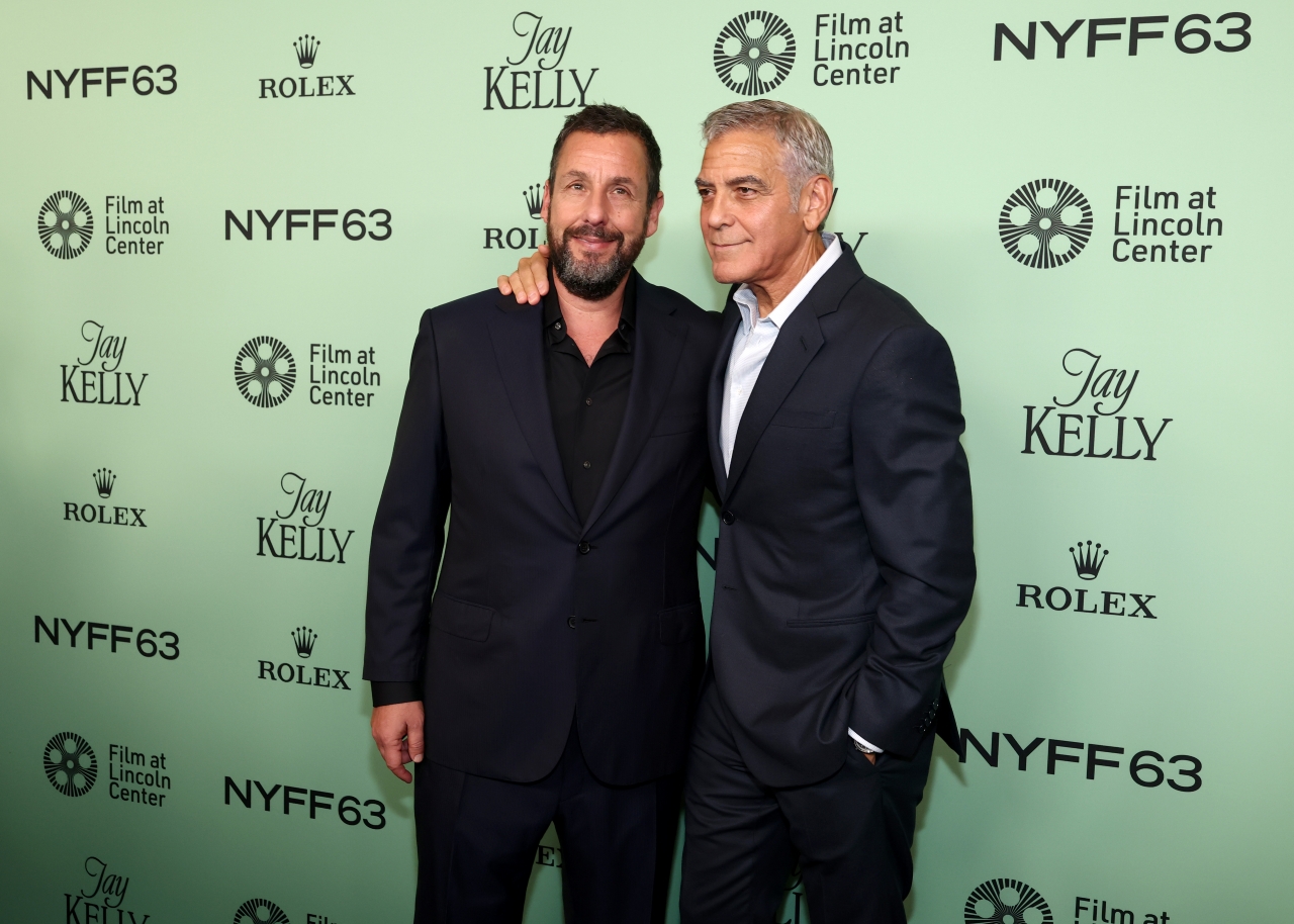 NEW YORK, NEW YORK - SEPTEMBER 29: (L-R) Adam Sandler and George Clooney attend the 