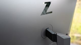 A silver HP Z27u G3 monitor on a bright desk