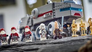 Lego Juggernaut vehicle on a rocky outcrop with Clone, Jedi, and Battle Droid minifigures