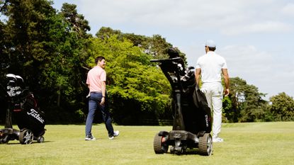Image of players on a golf course