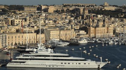 A superyacht in the Grand Harbour in Valletta, Malta