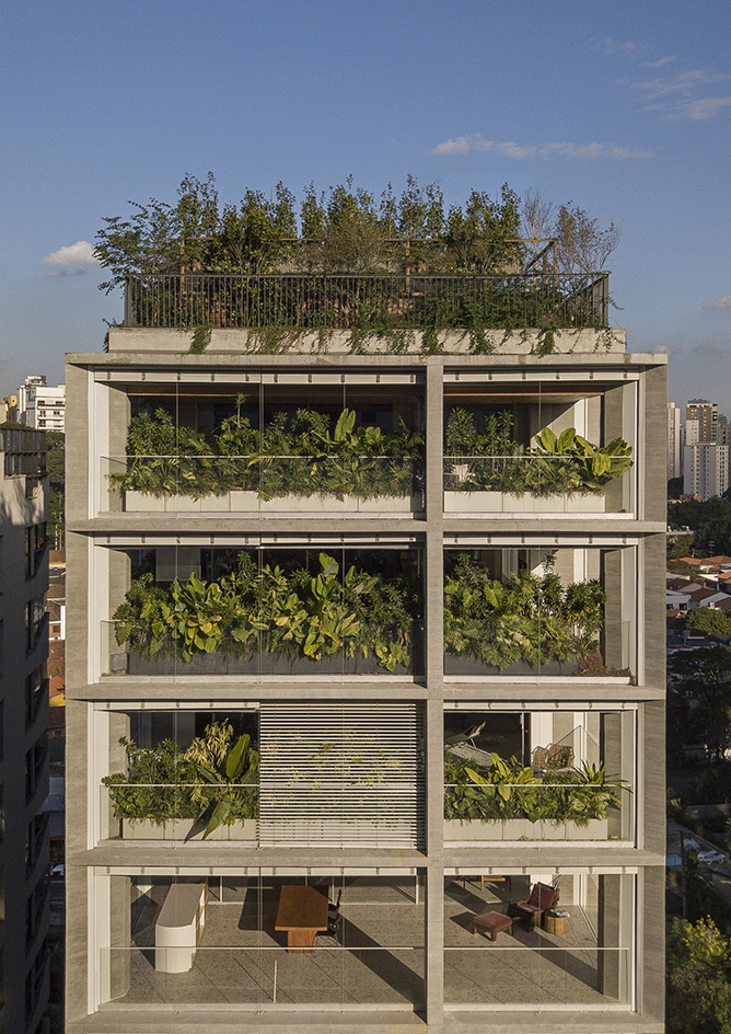 green work by work by Rodrigo Oliviera landscape architect against modern buildings