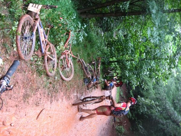 Bikes all lined up while riders get support at aid station three.