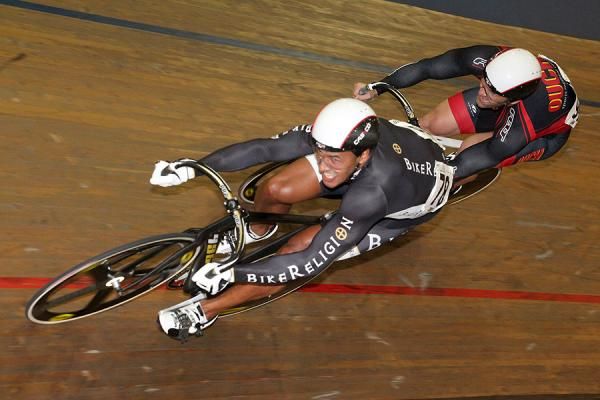 Giddeon Massie takes ride one over Jimmy Watkins in the Men's Match Sprint Final.