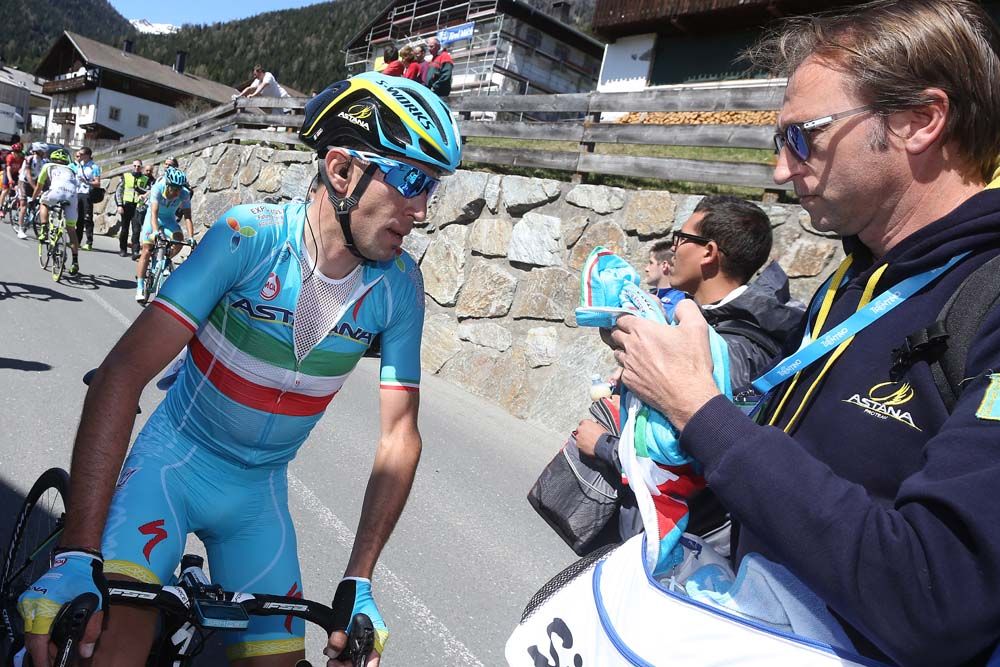 Vincenzo Nibali (Astana) covers up fro the descent to the team bus