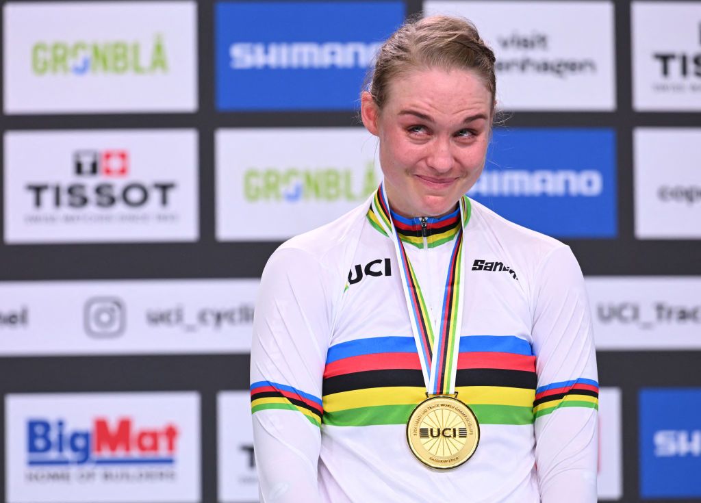 Denmark&#039;s Julie Leth reacts on the podium after winning women&#039;s Points race ahead of Lotte Kopecky (Belgium)