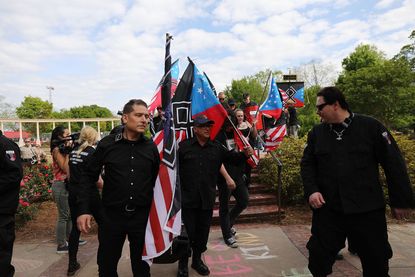 Members and supporters of the National Socialist Movement, one of the largest neo-Nazi groups in the US, hold a rally on April 21, 2018 in Newnan, Georgia. 