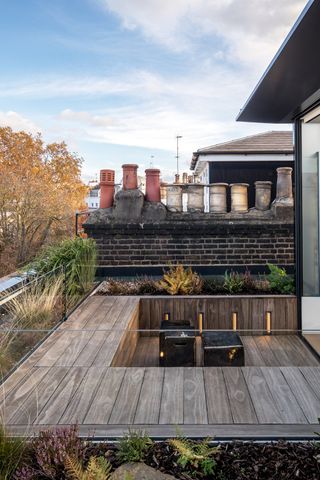 modern roof top garden with glass border