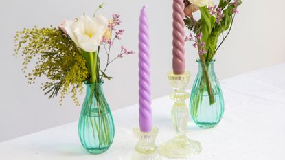 Pretty spring florals and twisted candles in pastel hues.