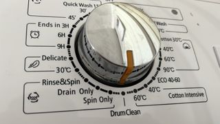 how to waterproof a jacket: washing machine dial