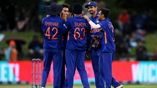 India ODI team celebrate a wicket against NZ together