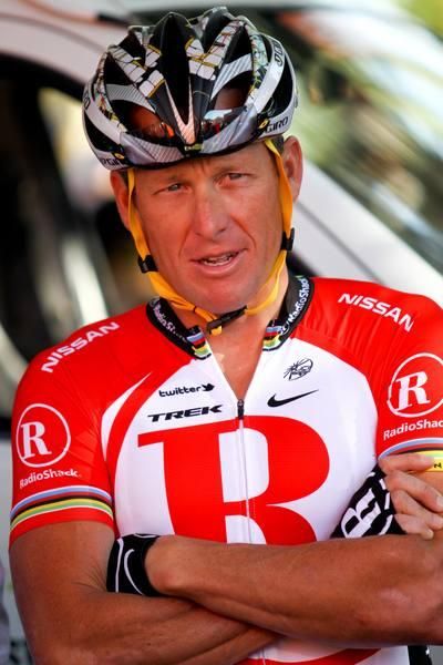 Lance Armstrong waits for the team presentation.