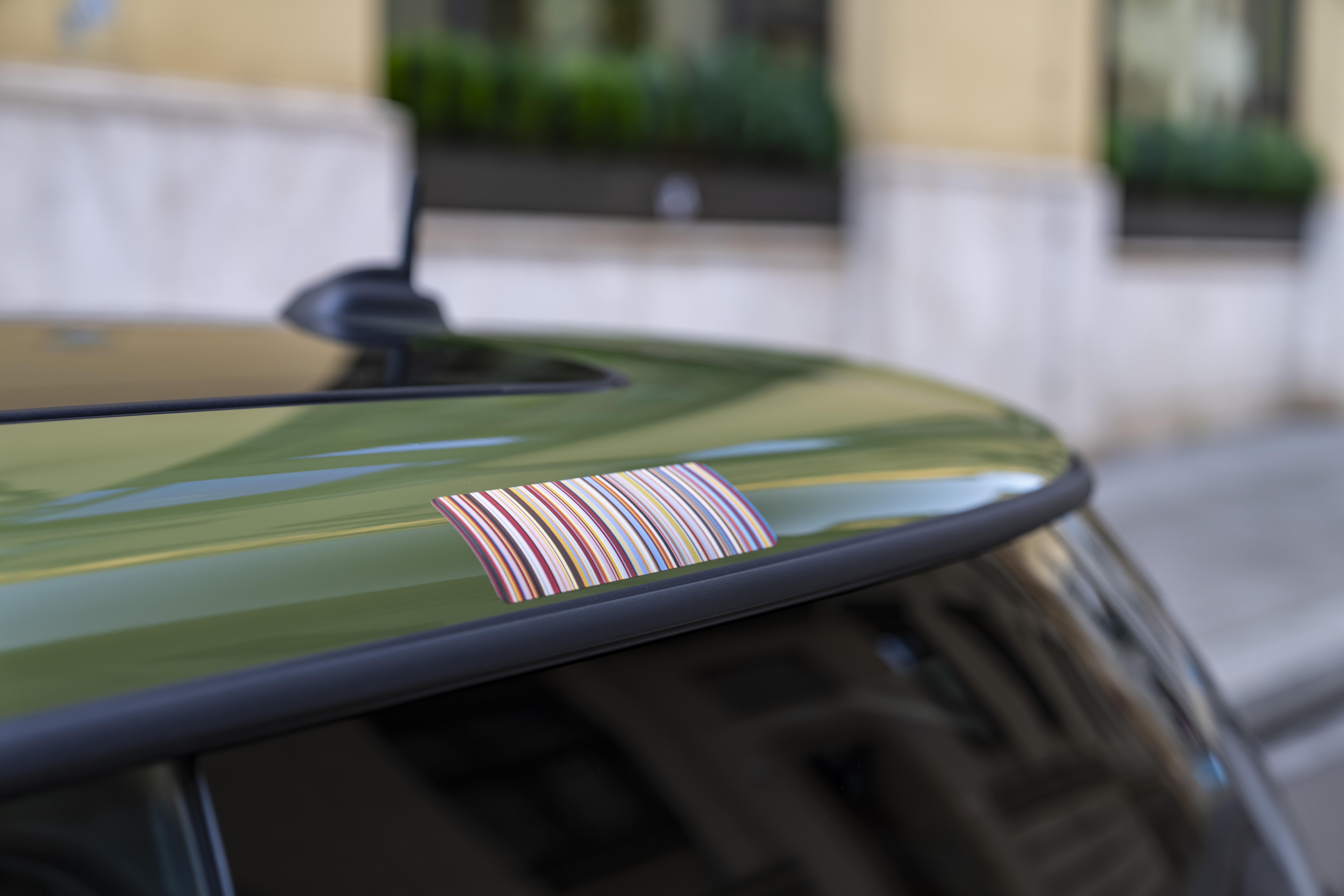 Images of the Paul Smith mini. It's cream with a green roof, and has flashes of Paul Smith flair throughout.