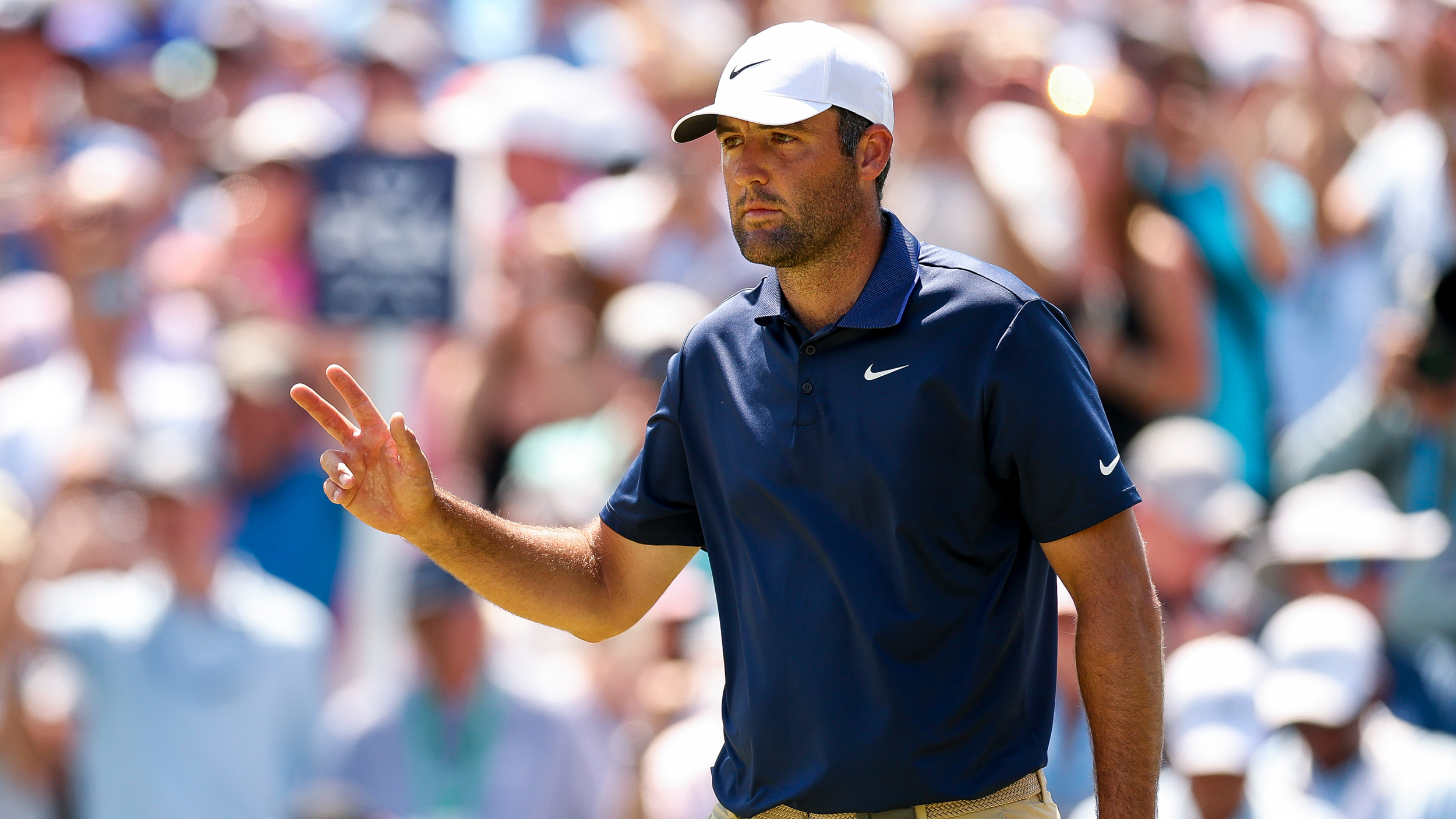 Scottie Scheffler salutes the crowd at the PGA Championship