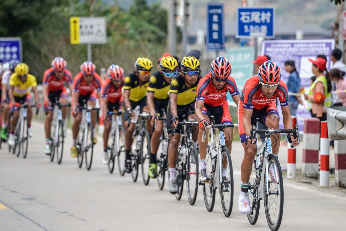Racing towards the final climb on stage 4 of the Tour of Fuzhou