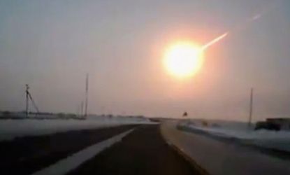 A fireball-looking meteor streaks across the sky of Russia's Ural Mountains on Feb. 15.