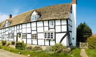 black and white timber framed home typical of the three counties in the West Midlands