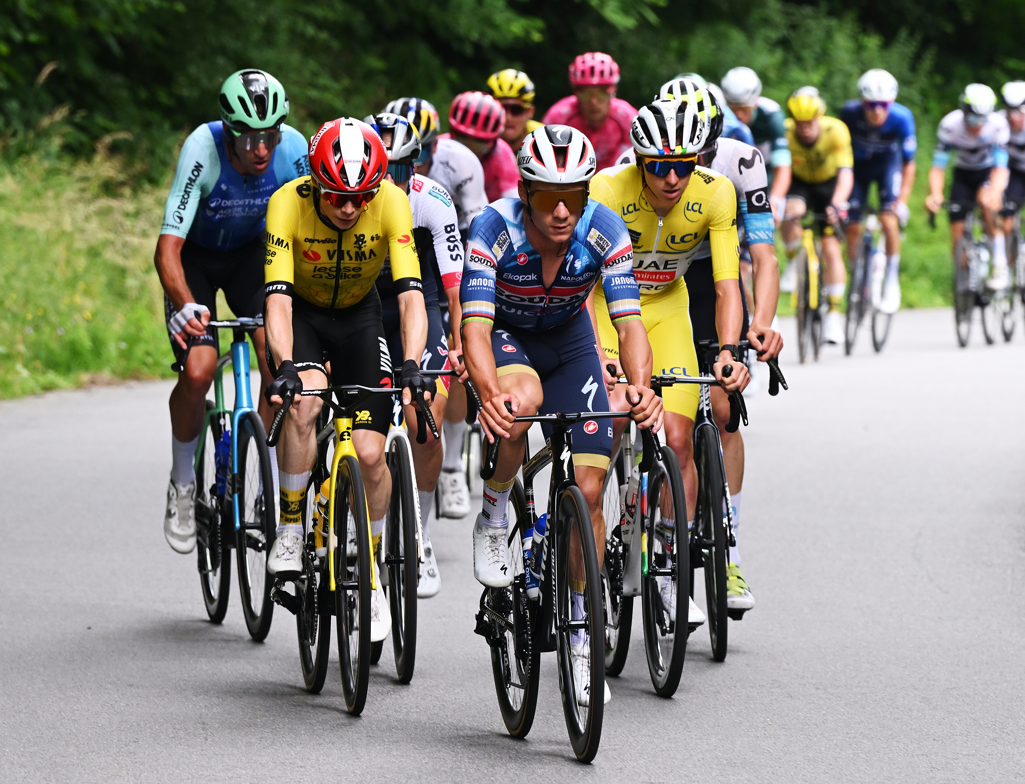 PLATEAU DU MONT-CENIS, FRANCE - JUNE 15: (L-R) Jonas Vingegaard of Denmark and Team Visma | Lease a Bike, Remco Evenepoel of Belgium and Team Soudal Quick-Step and Tadej Pogacar of Slovenia and UAE Team Emirates - XRG - Yellow leader jersey compete during the 77th Criterium du Dauphine 2025, Stage 8 a 133.3km stage from Val-d&#039;Arc to Plateau du Mont-Cenis 2095m / #UCIWT / on June 15, 2025 in Plateau du Mont-Cenis, France. (Photo by Dario Belingheri/Getty Images)
