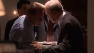 Martin Sheen leaning in to learn the news that Zoey has been kidnapped in The West Wing