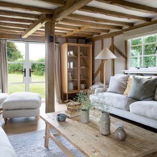 farmhouse with modern extension decorated in shades of grey and white