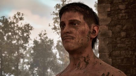 Gothic 1 Remake Mud: A close-up shot of Mud, a mud-covered man, standing next to a castle wall.