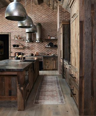 rustic kitchen with exposed brick walls