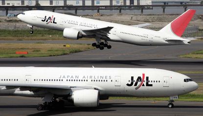 A Japan Airlines flight takes off after drunk pilot removed from plane